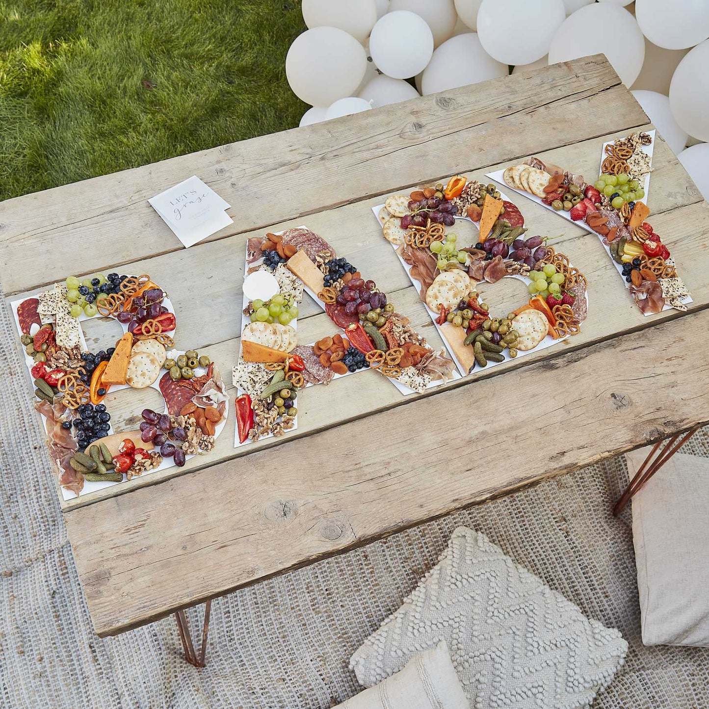 baby shower words 'BABY' grazing table food display tray decorations