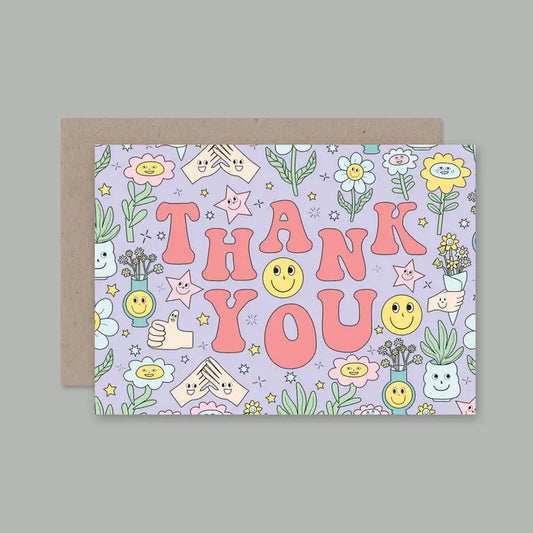 pastel purple thank you greeting card with smiley faces, stars and flowers printed on it