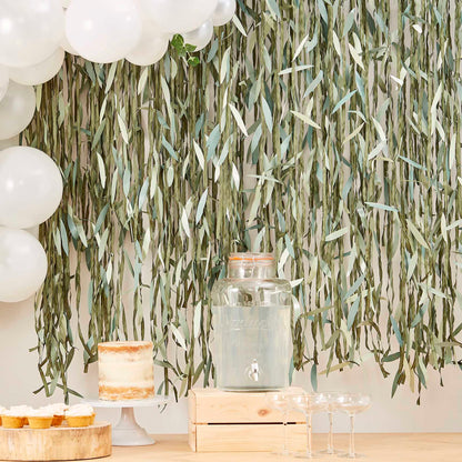 artificial green leaf backdrop for a boho theme botanical party idea decoration