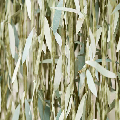 artificial green leaf backdrop for a boho theme botanical party idea decoration