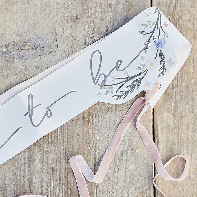 floral flower sash that says 'bride to be' for a boho themed or garden cocktail party bridal shower, hens party or bachelorette party