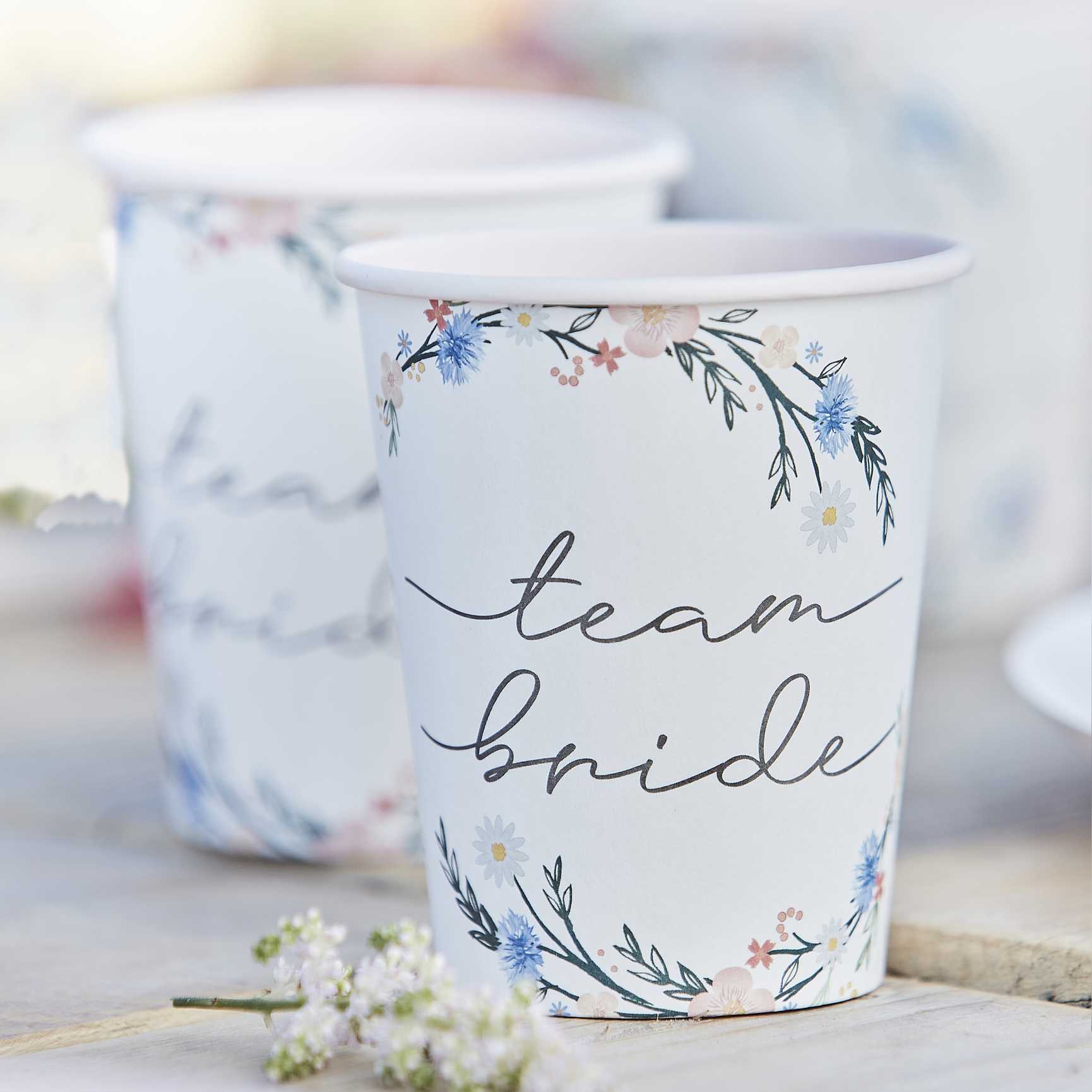 floral flower design paper party cups with the writing 'team bride' on them for a boho theme bridal shower, hens party or bachelorette party