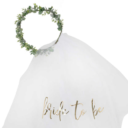 botanical greenery leaf theme veil headband with the words 'bride to be' printed on it for a bridal shower, hend party or bachelorette party gift