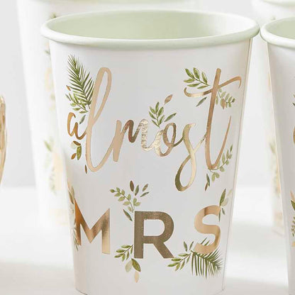 green botanical design hens party paper party cups with the words 'almost mrs' printed on them and a leaf design for a bridal shower, hens party or bachelorette party decorations