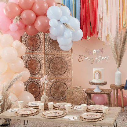 pastel nude coloured hanging banner bunting that says the words 'happy everything' for a birthday party decoration