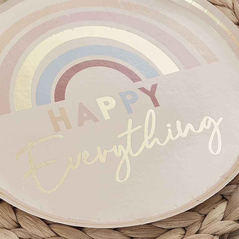 muted pastel tones paper party plates that read the words 'happy everything' on them with pastel rainbow designs for a joyful happy birthday party theme