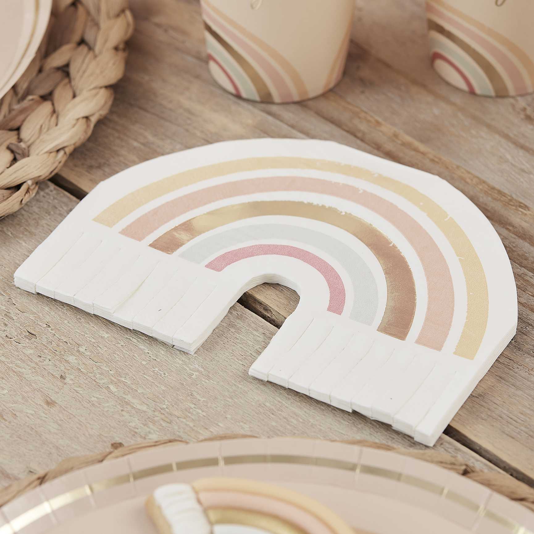 muted pastel neutral themed paper party napkins that are in the shape of a rainbow featuring muted pastel earthy tones for a happy joyful birthday party theme