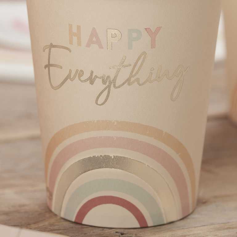 nude pastel themed paper party cups that read the words 'happy everything' with rainbows on them for a happy joyful birthday party theme