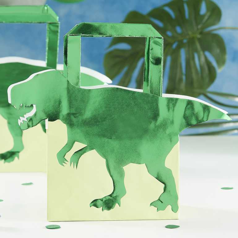 green dinosaur paper party bags with a 3d dinosaur design for a kids dinosaur party theme treat or gift bags