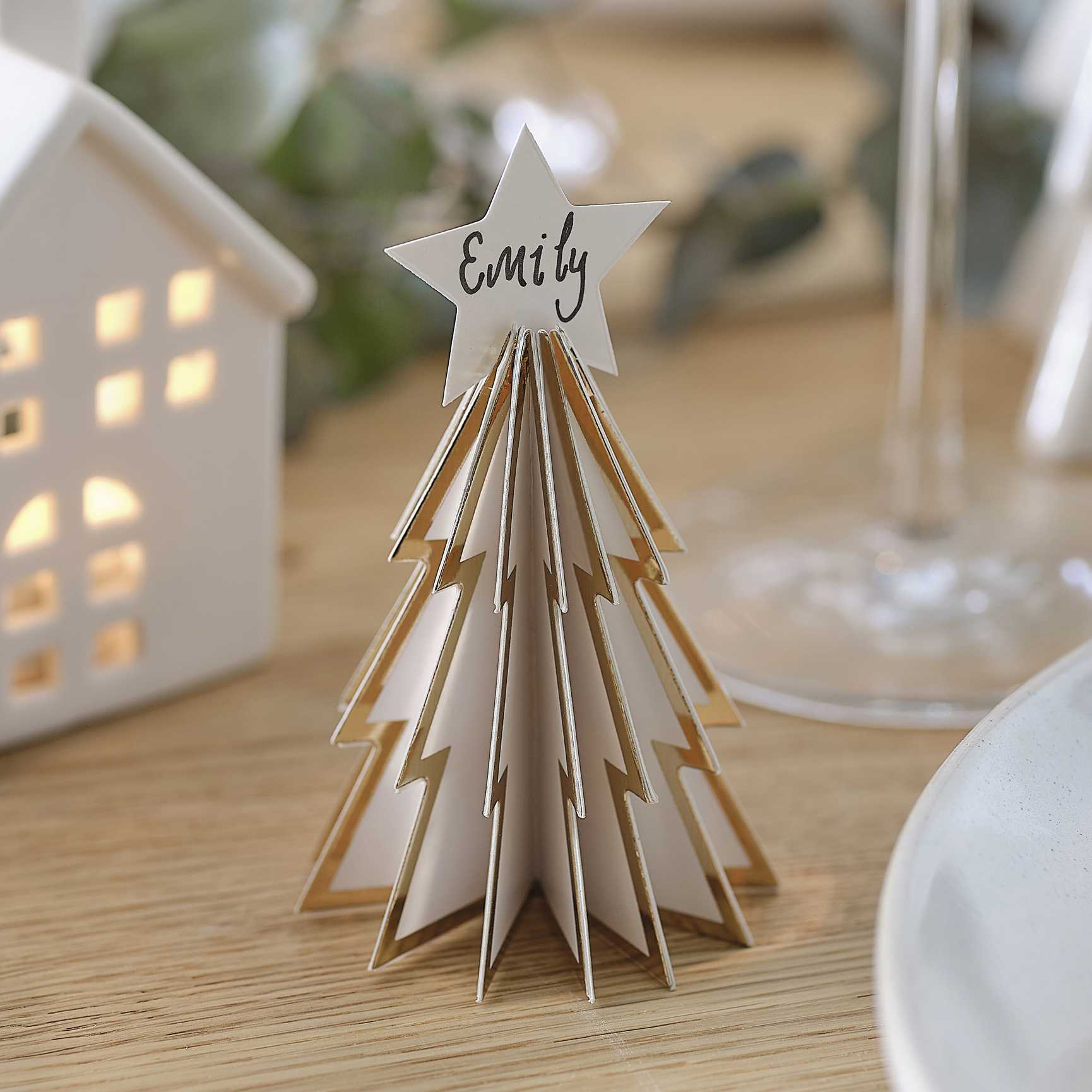 white and gold christmas tree name place cards