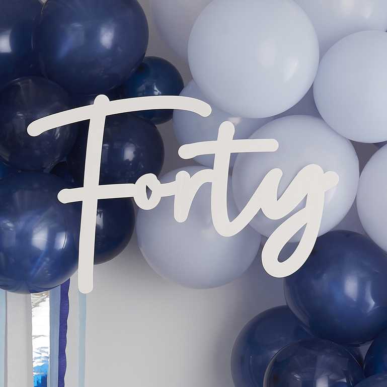 white backdrop sign that says 'Forty' for a 40th birthday party decorations