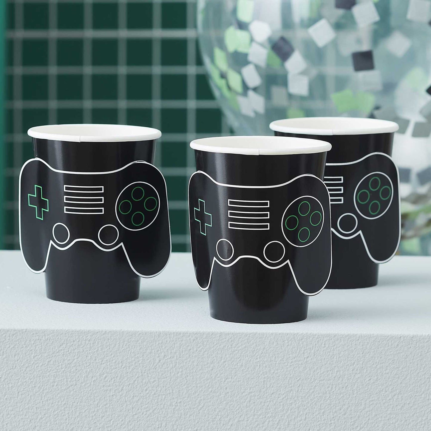 playstation or xbox themed paper party cups with pop out 3d design game controller for kids birthday parties