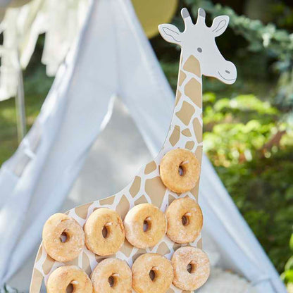 Giraffe shaped doughbnut display stand for a wild animal jungle safari theme birthday party for kids