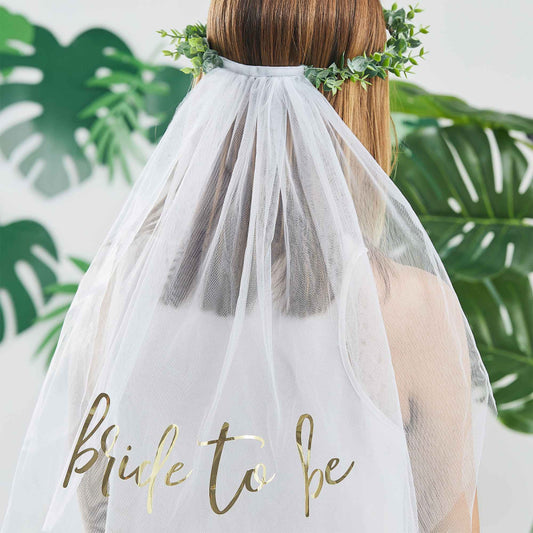 botanical greenery leaf theme veil headband with the words 'bride to be' printed on it for a bridal shower, hend party or bachelorette party gift