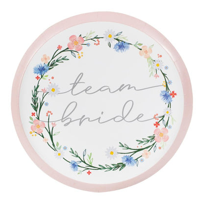 floral flower design paper party plates with the words 'team bride' written on them for a boho or garden party theme bachelorette, bridal shower or hens party