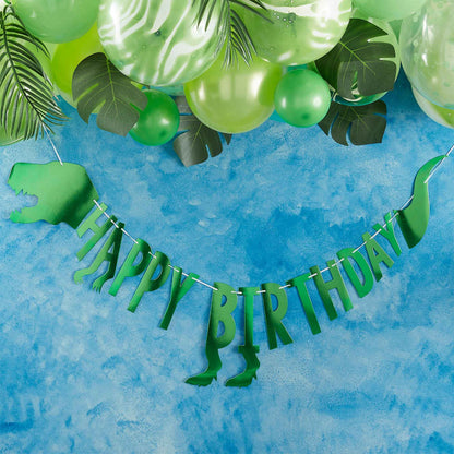 green dinosaur baner bunting with the words 'happy birthday' for a kids dinosaur birthday party theme party decorations